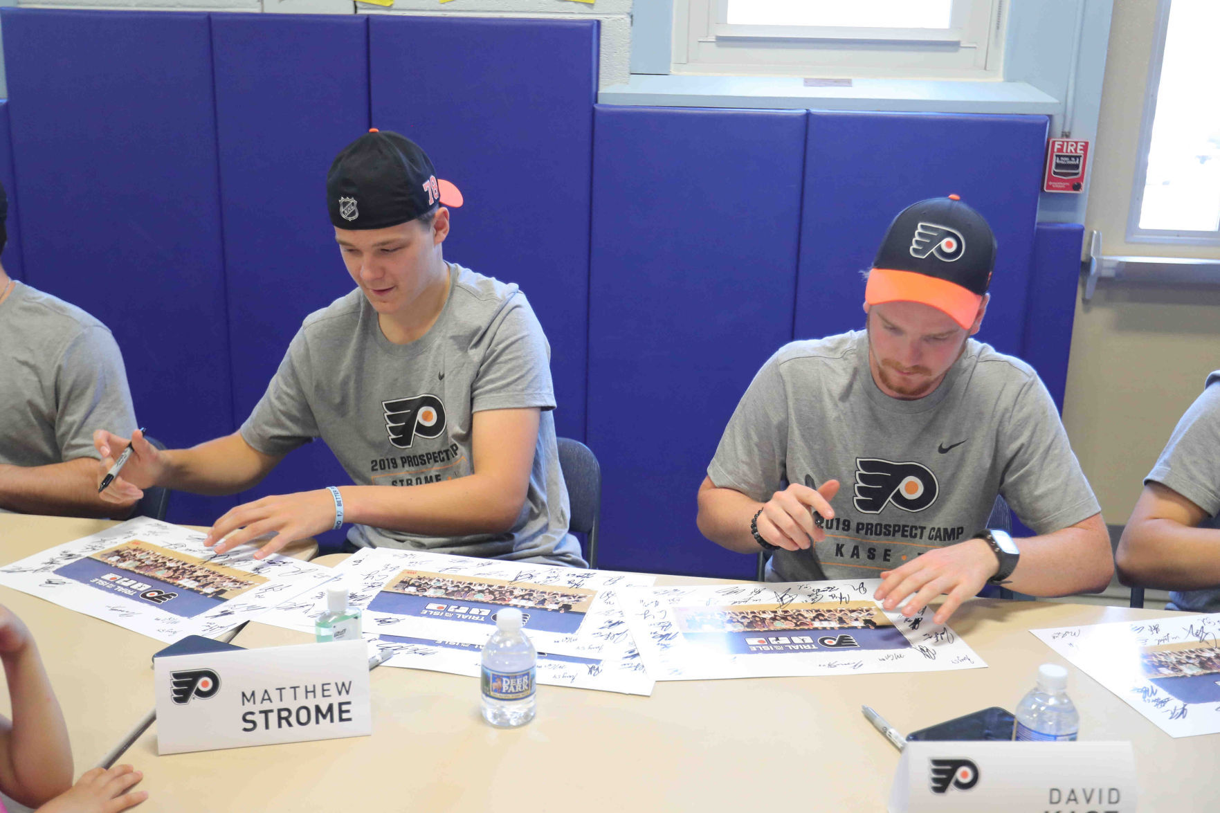 Philadelphia Flyers prospects sign autographs and play volleyball
